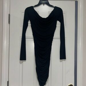Small stretchy black dress with open back